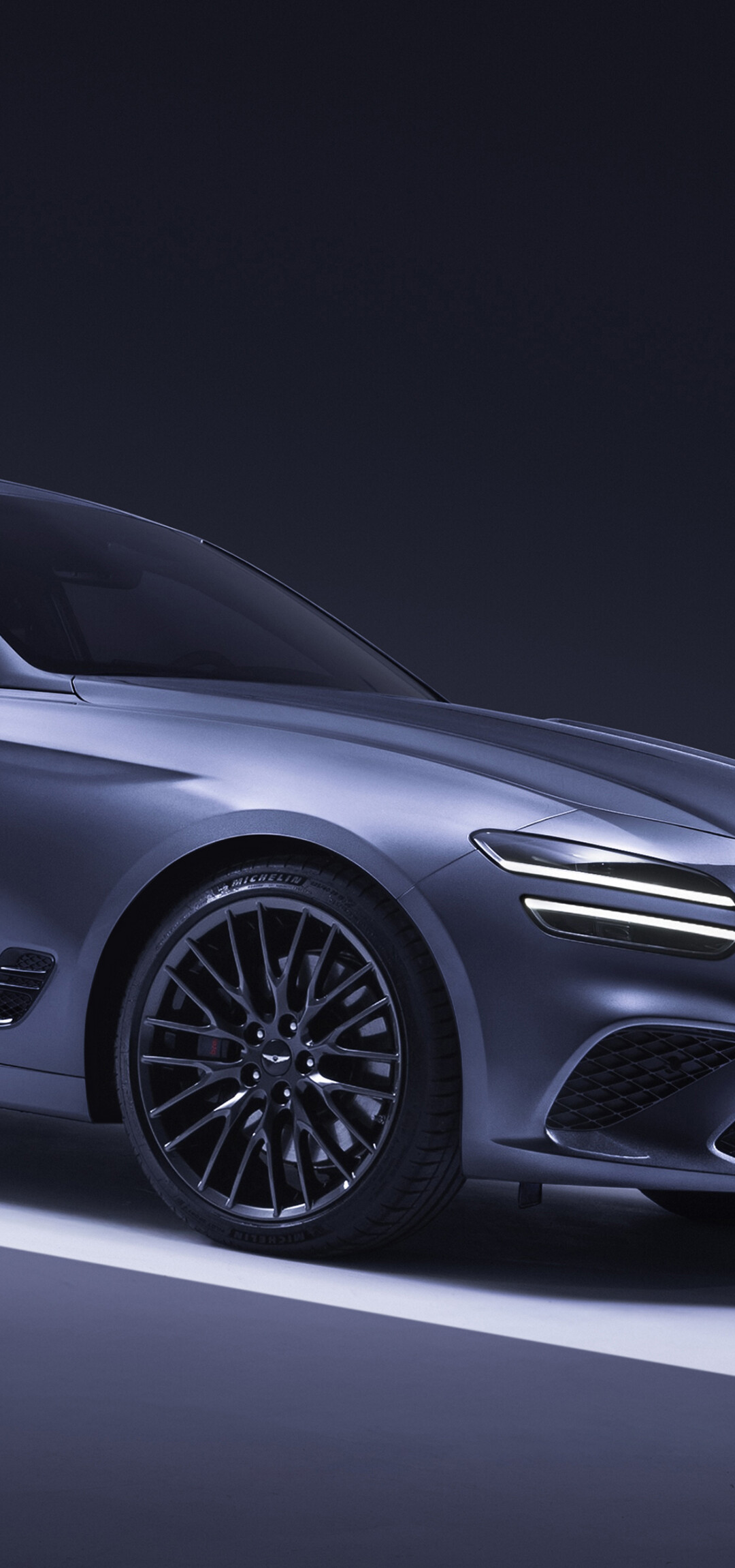 A sleek and futuristic 2026 Genesis G70 luxury sedan displaying modern automotive design and aerodynamic curves.