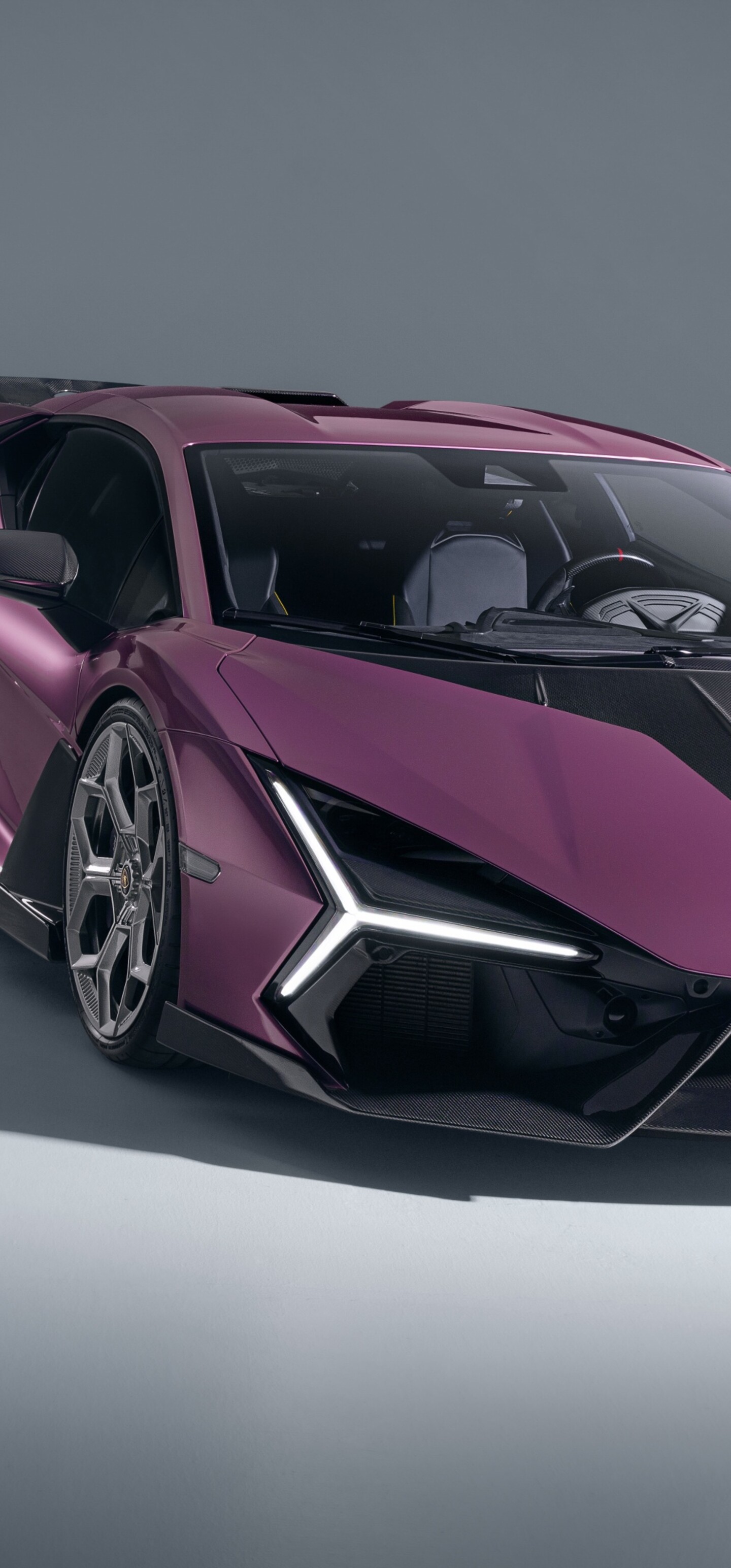 A high-resolution, detailed view of a 2026 Lamborghini Revuelto modified by Novitec, featuring aggressive aerodynamic body kits and a sleek, futuristic finish.