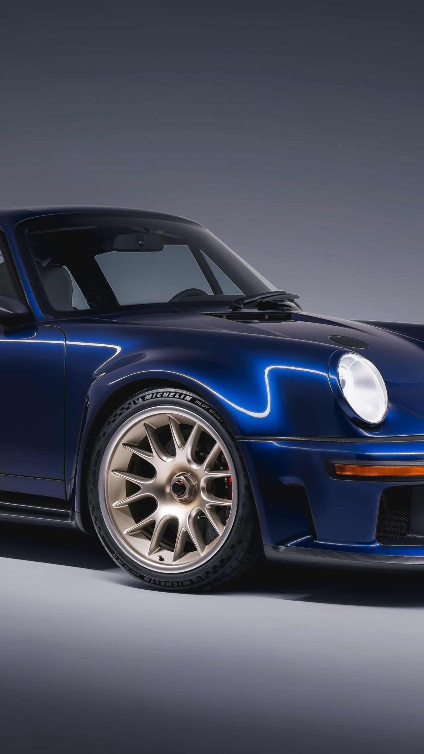 A sleek and futuristic 2026 Porsche 911 sports car featuring modern aerodynamic lines and advanced LED lighting.