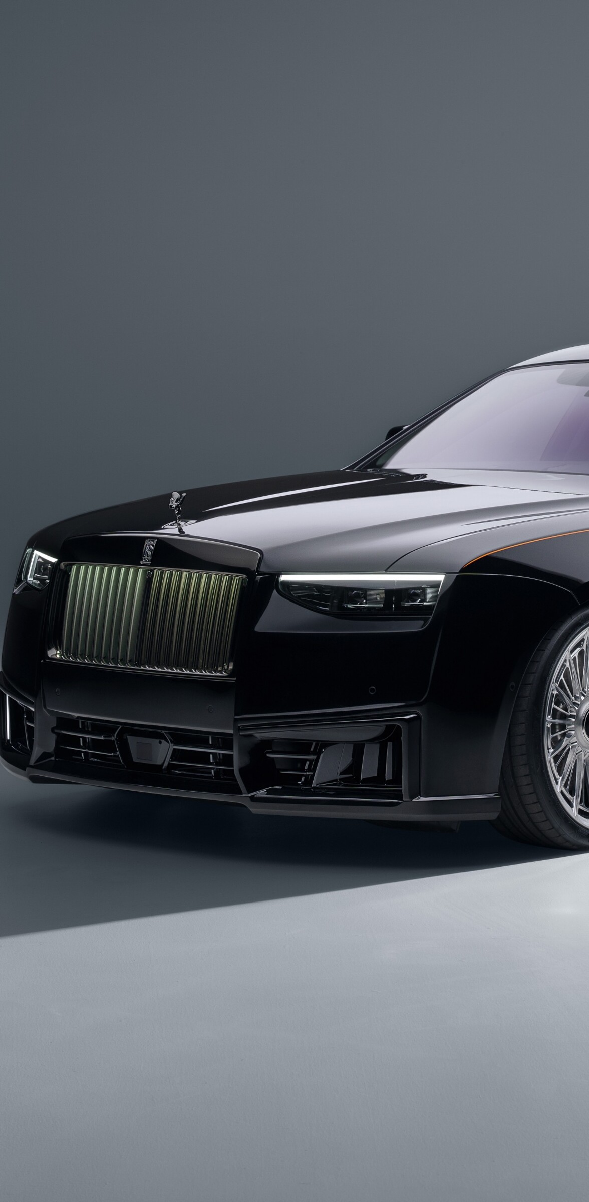 A high-resolution, detailed view of the 2026 Rolls-Royce Black Badge Ghost featuring a sleek black finish and luxury automotive design.