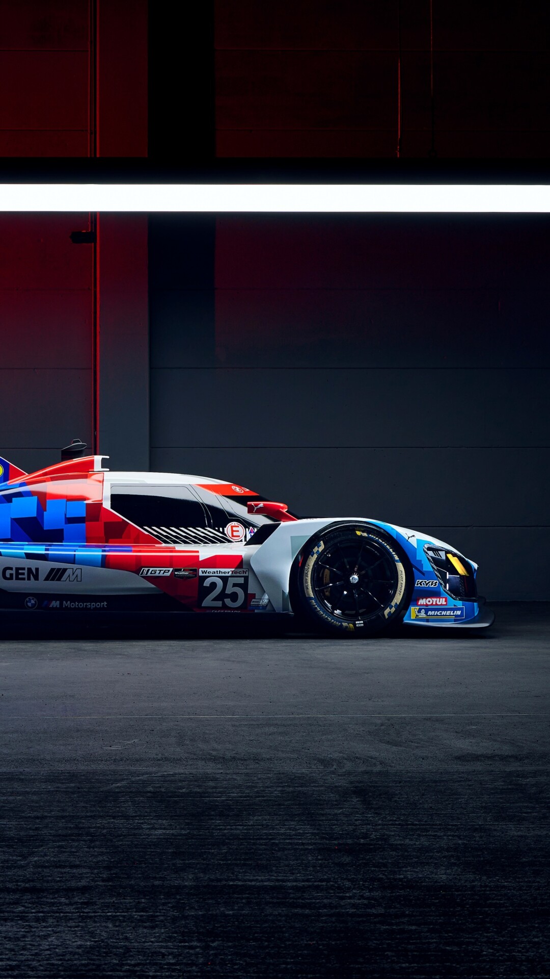 A highly detailed view of the BMW M Hybrid V8 LMDh prototype race car featuring advanced aerodynamic bodywork.