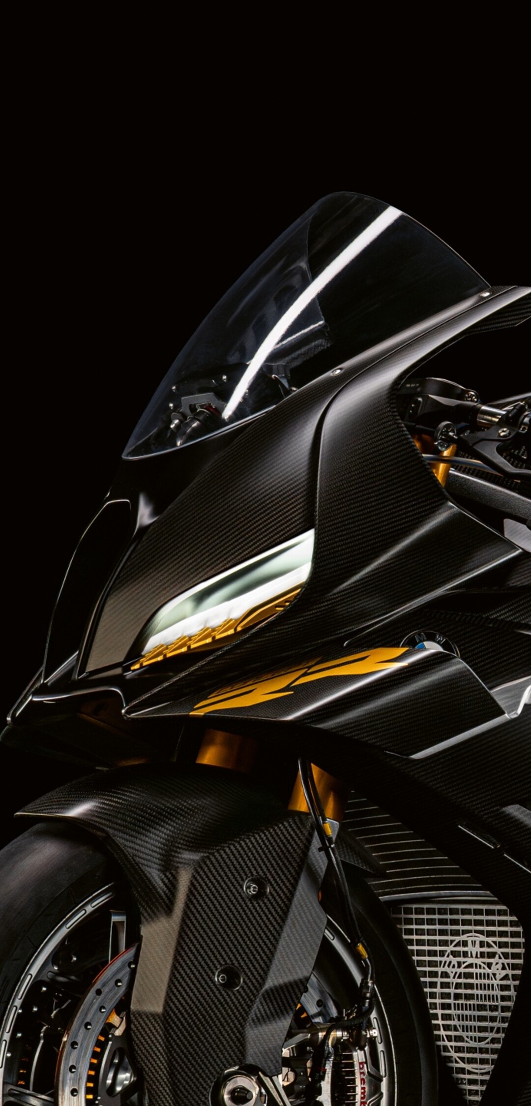 A futuristic BMW Motorrad Concept RR motorcycle with sleek aerodynamic features set against a dark, dramatic background.