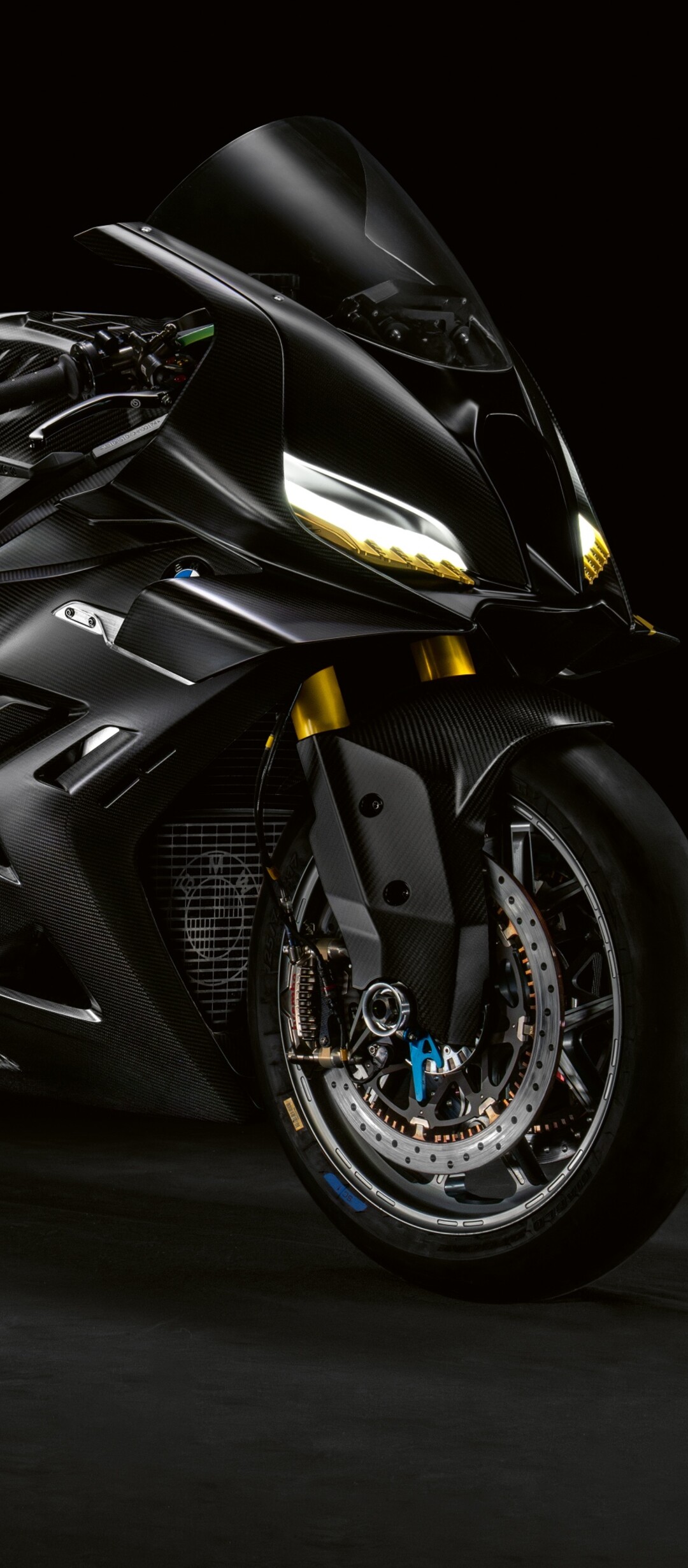 A futuristic BMW Motorrad Concept RR motorcycle showcased in a dark, cinematic atmosphere with a sleek, aggressive design.