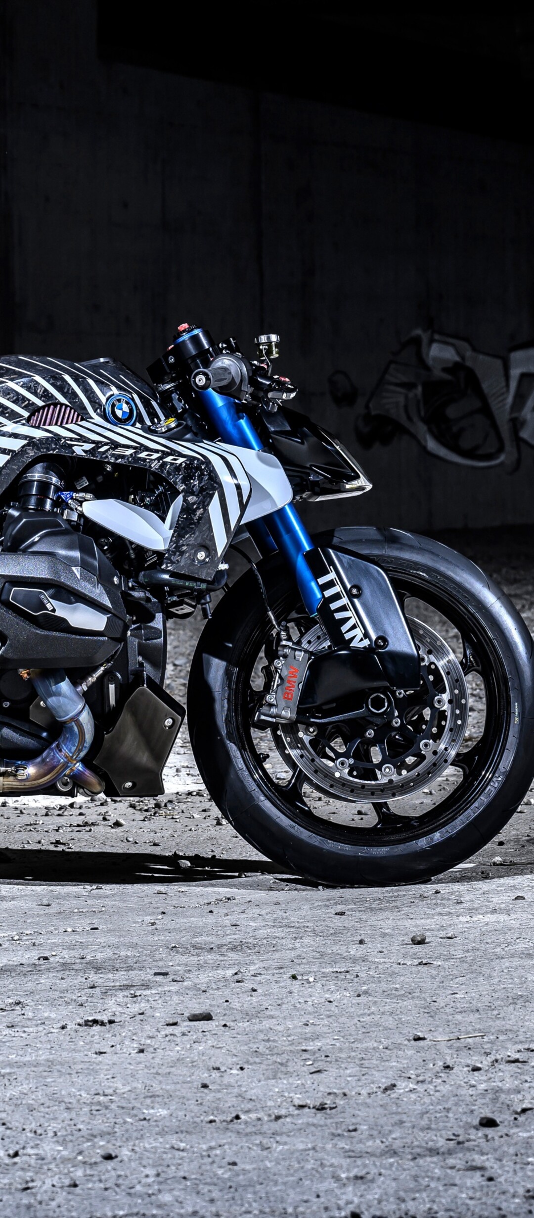A detailed, high-resolution shot of the custom BMW R 1300 R Titan motorcycle featuring a metallic premium finish.