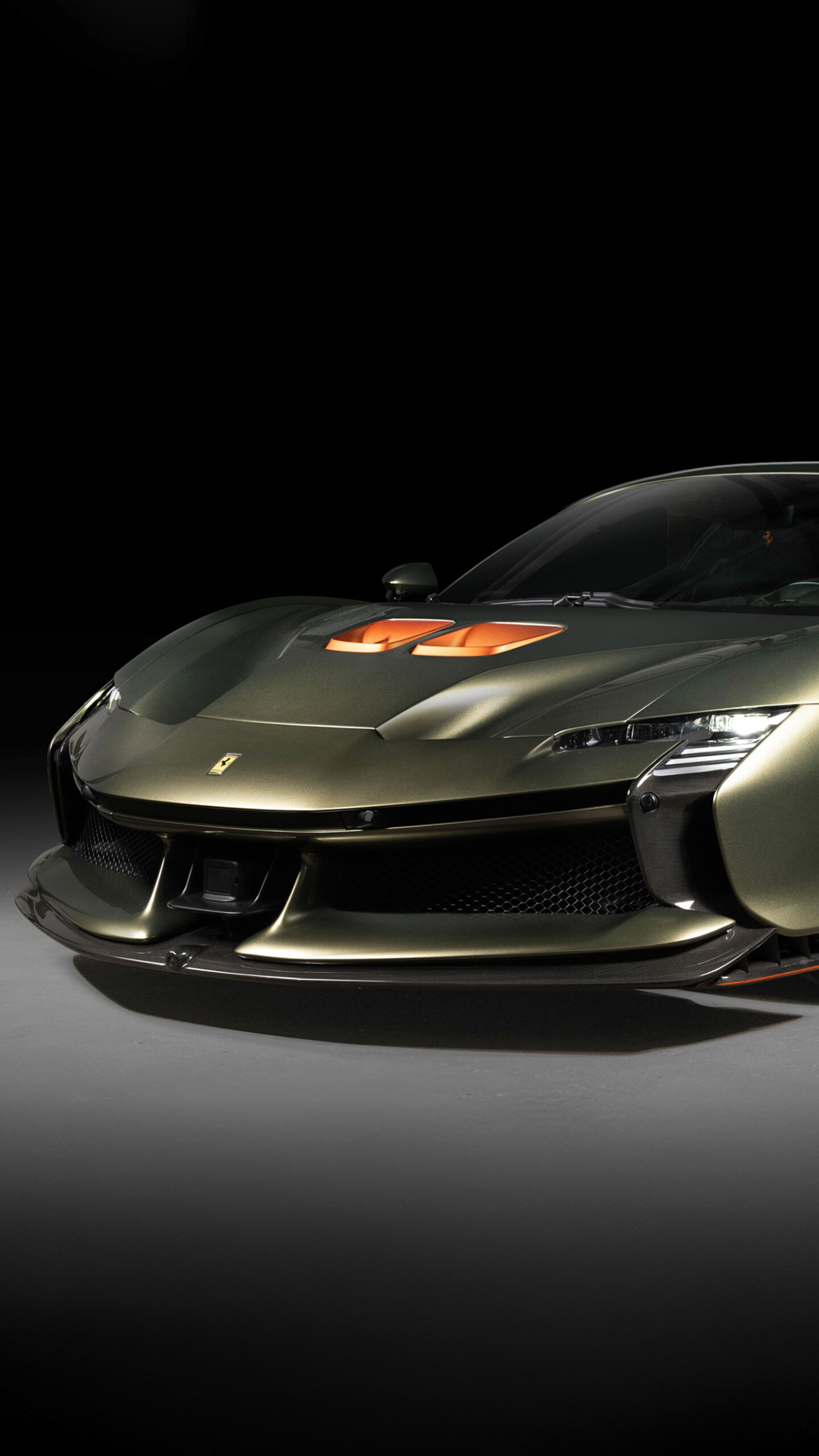 A high-resolution shot of a Ferrari SF90 XX Spider supercar positioned against a dark, minimalist background.
