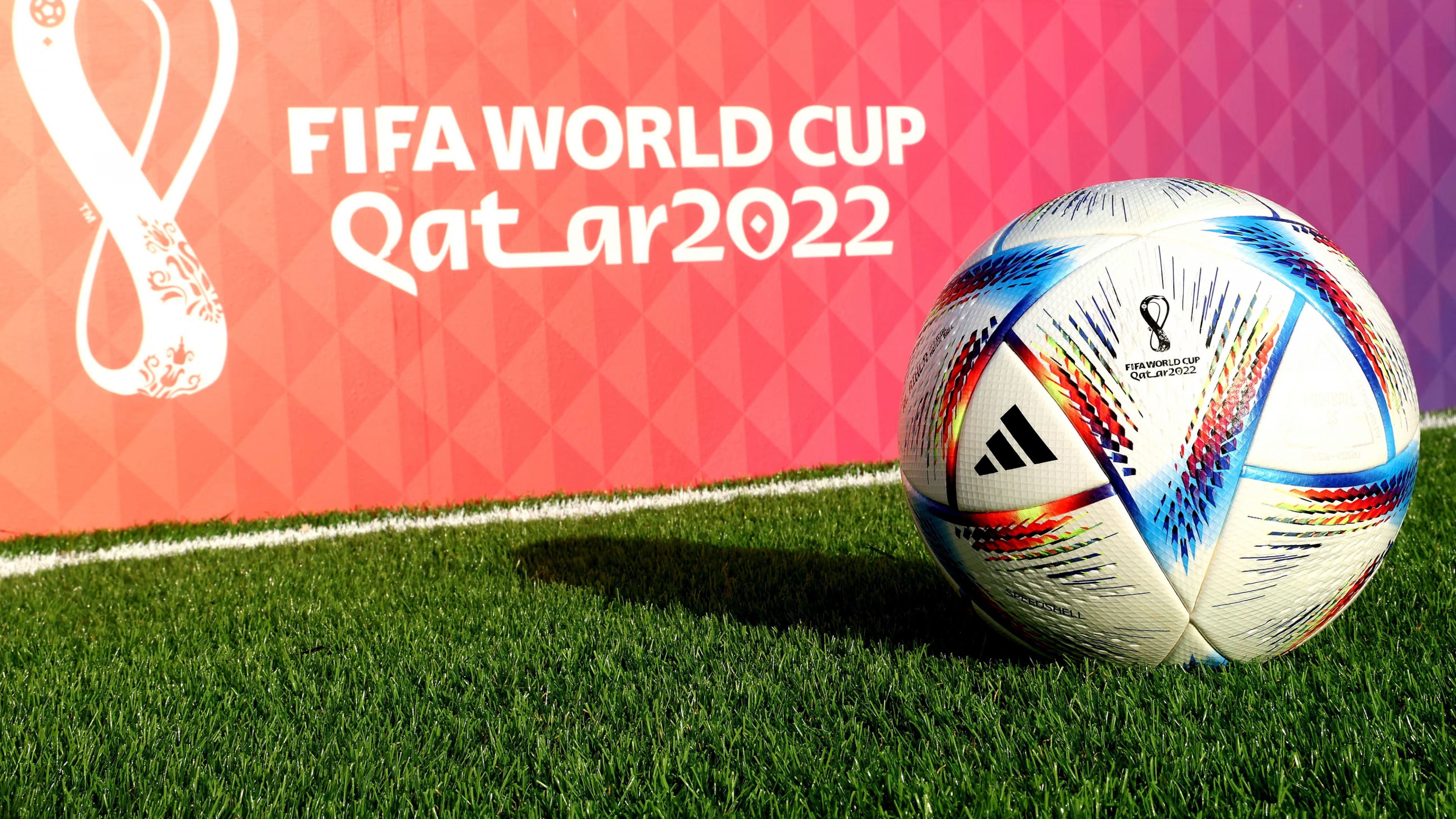A cinematic scene representing the excitement and atmosphere of the 2022 FIFA World Cup in Qatar, featuring football elements.