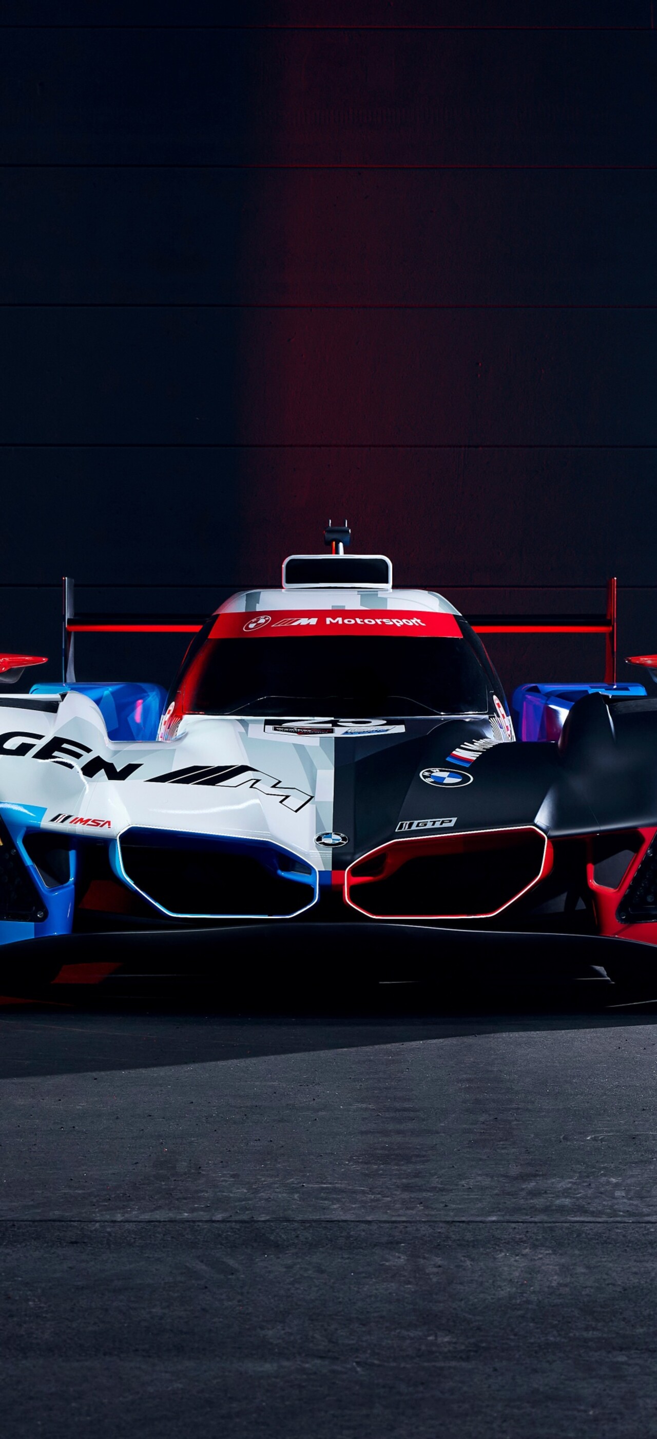 A high-performance BMW M Hybrid V8 race car featuring sleek aerodynamic bodywork and a powerful racing stance.