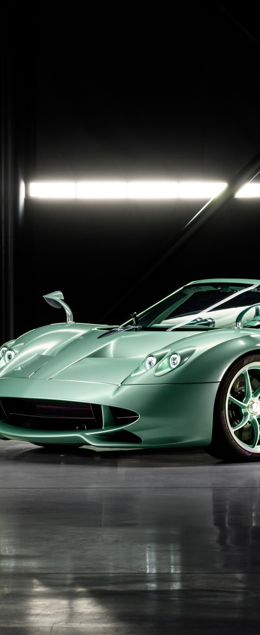 A high-resolution, sleek futuristic hypercar with aerodynamic bodywork and advanced lighting, showcasing 2026 automotive design.