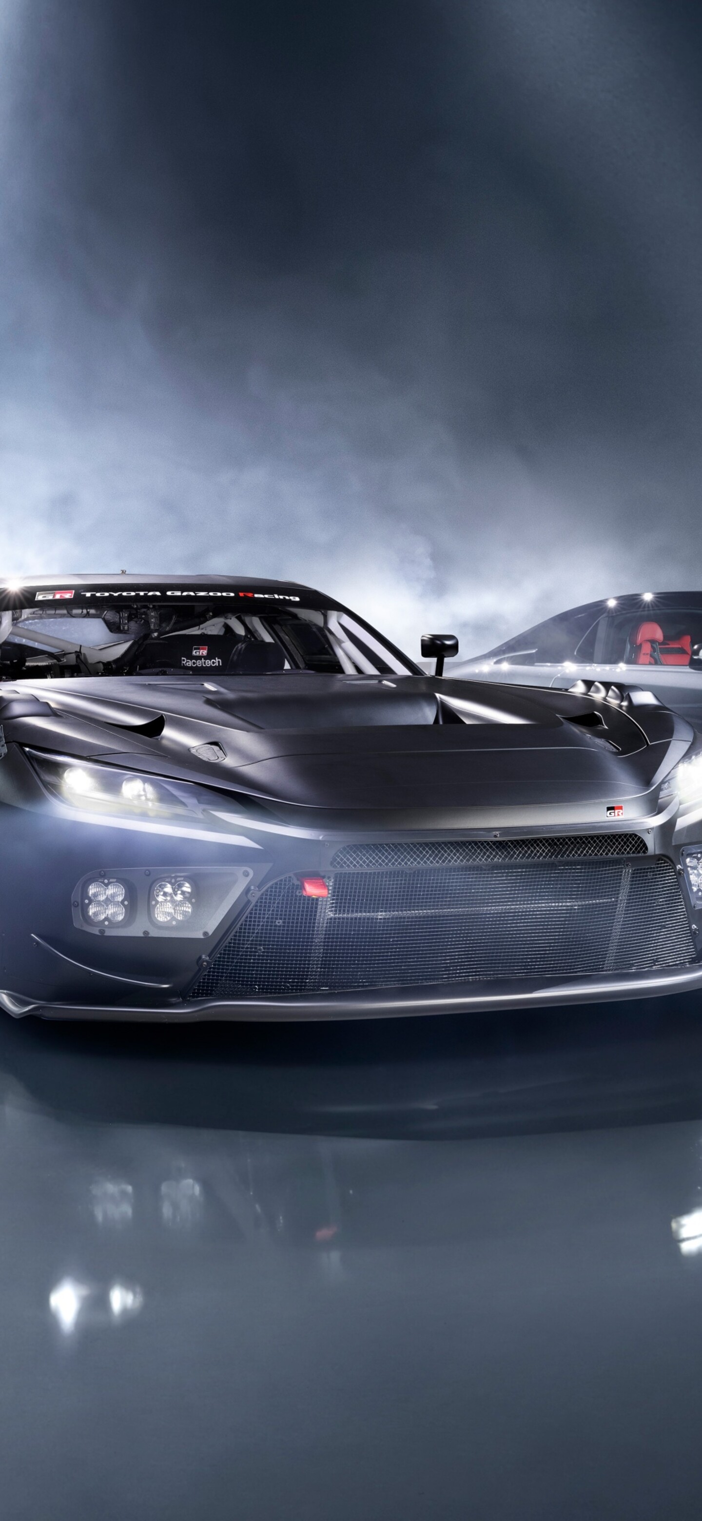 A collection of high-performance electric sports cars including the Lexus LFA Concept and Toyota GR GT racing prototypes in a cinematic setting.