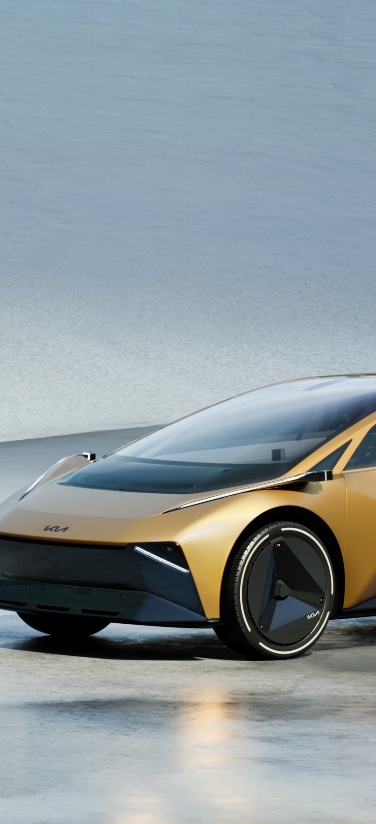 A sleek and futuristic Kia Vision Meta Turismo concept car with aerodynamic lines and advanced lighting.