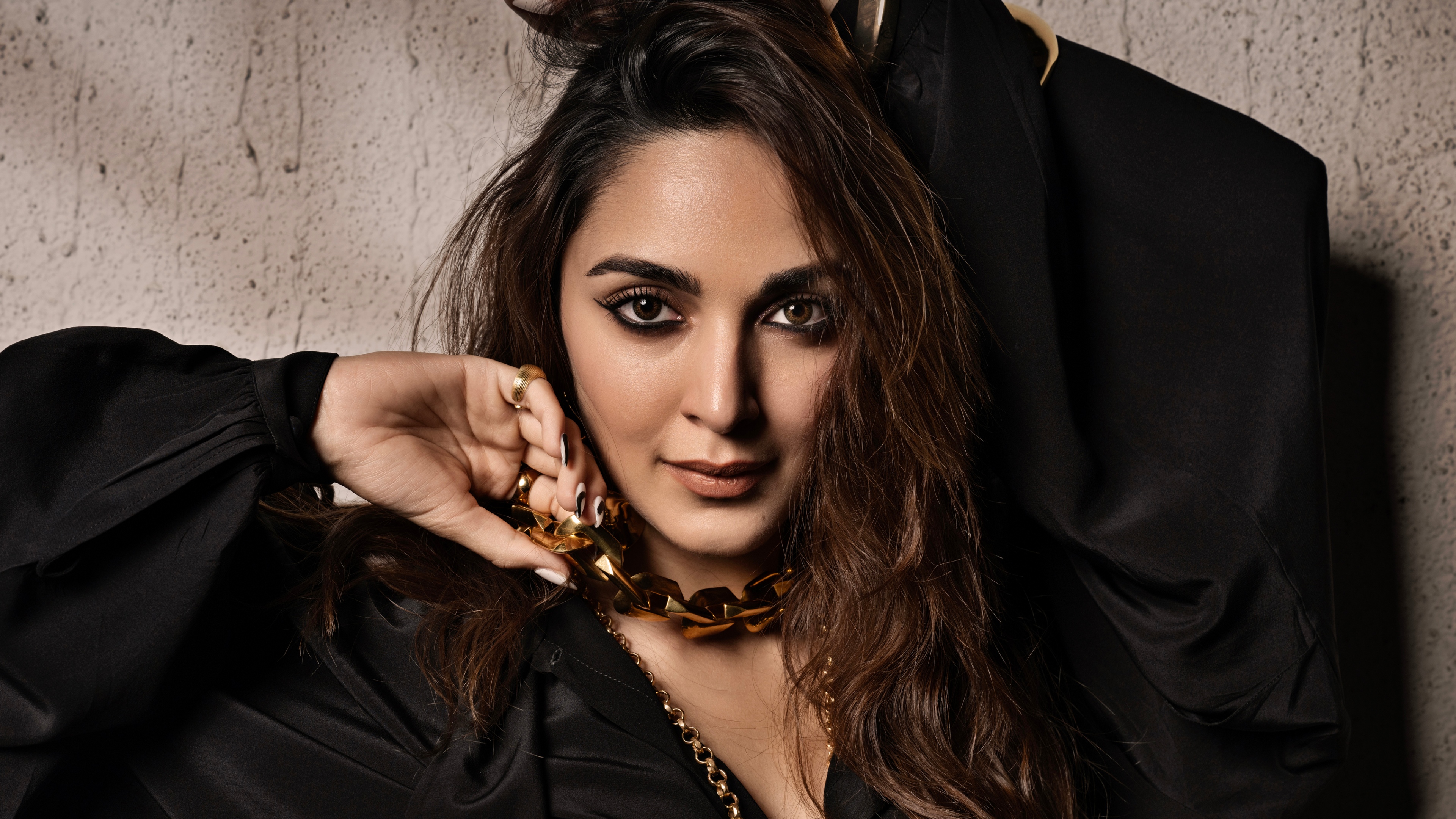 A high-resolution portrait of Indian actress Kiara Advani looking elegant.