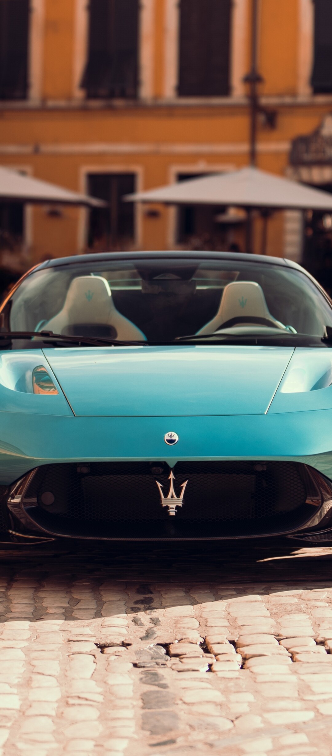 A high-resolution, vertical shot of the futuristic Maserati MCPURA Cielo luxury concept car.