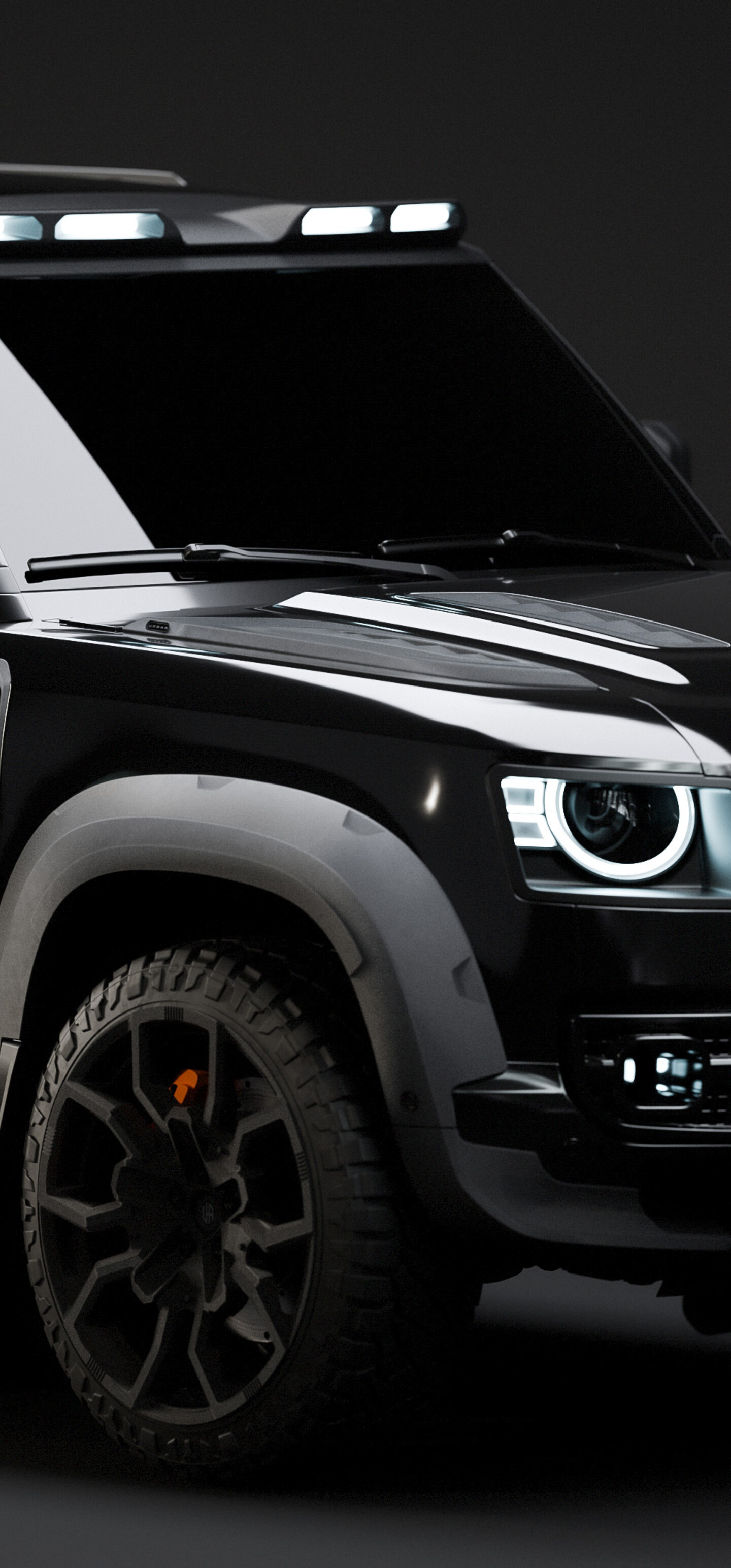 Glossy black cars parked in a dark, urban night setting.