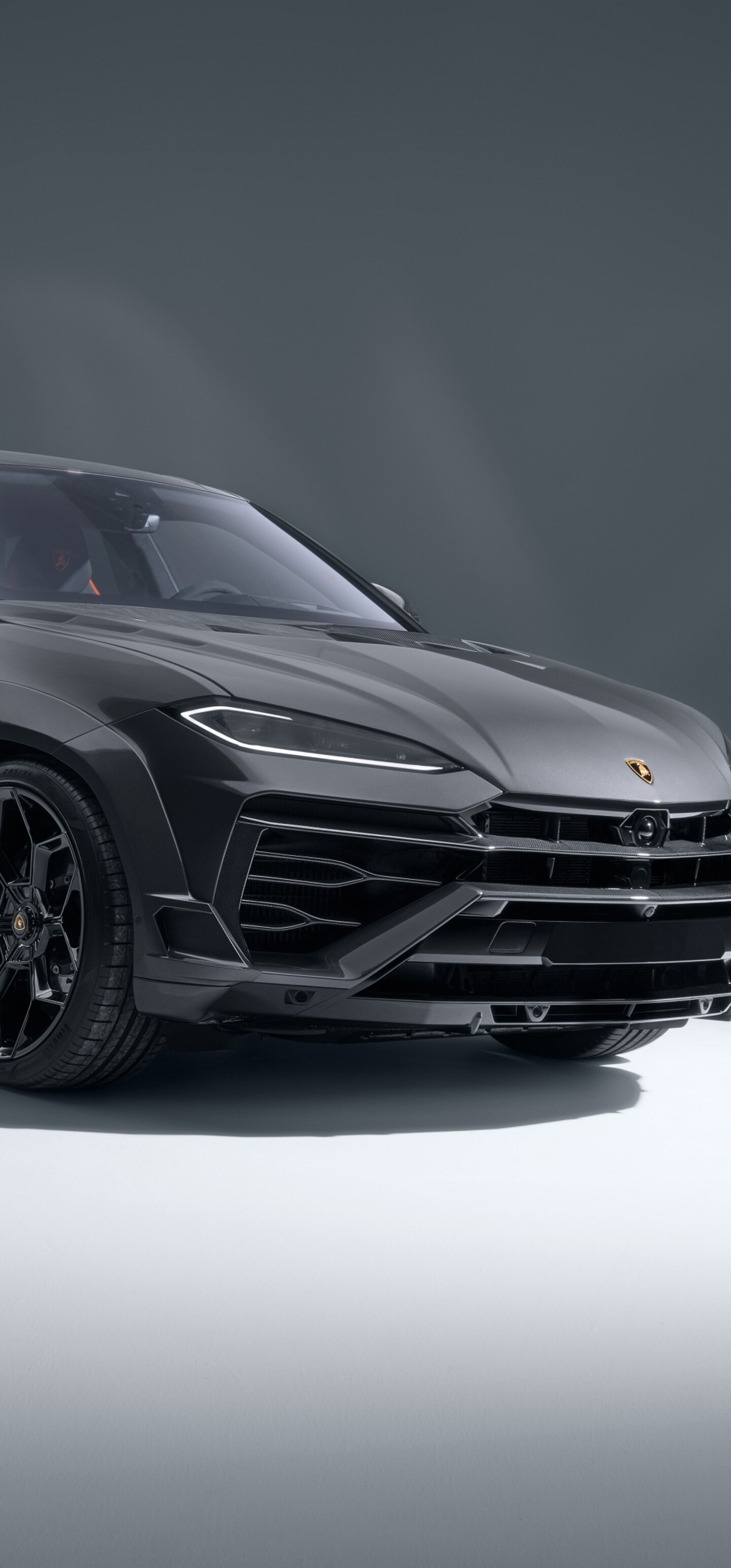 A high-detail, cinematic shot of a customized Novitec Lamborghini Urus SE 2025 luxury SUV featuring an aggressive widebody kit and premium finish.