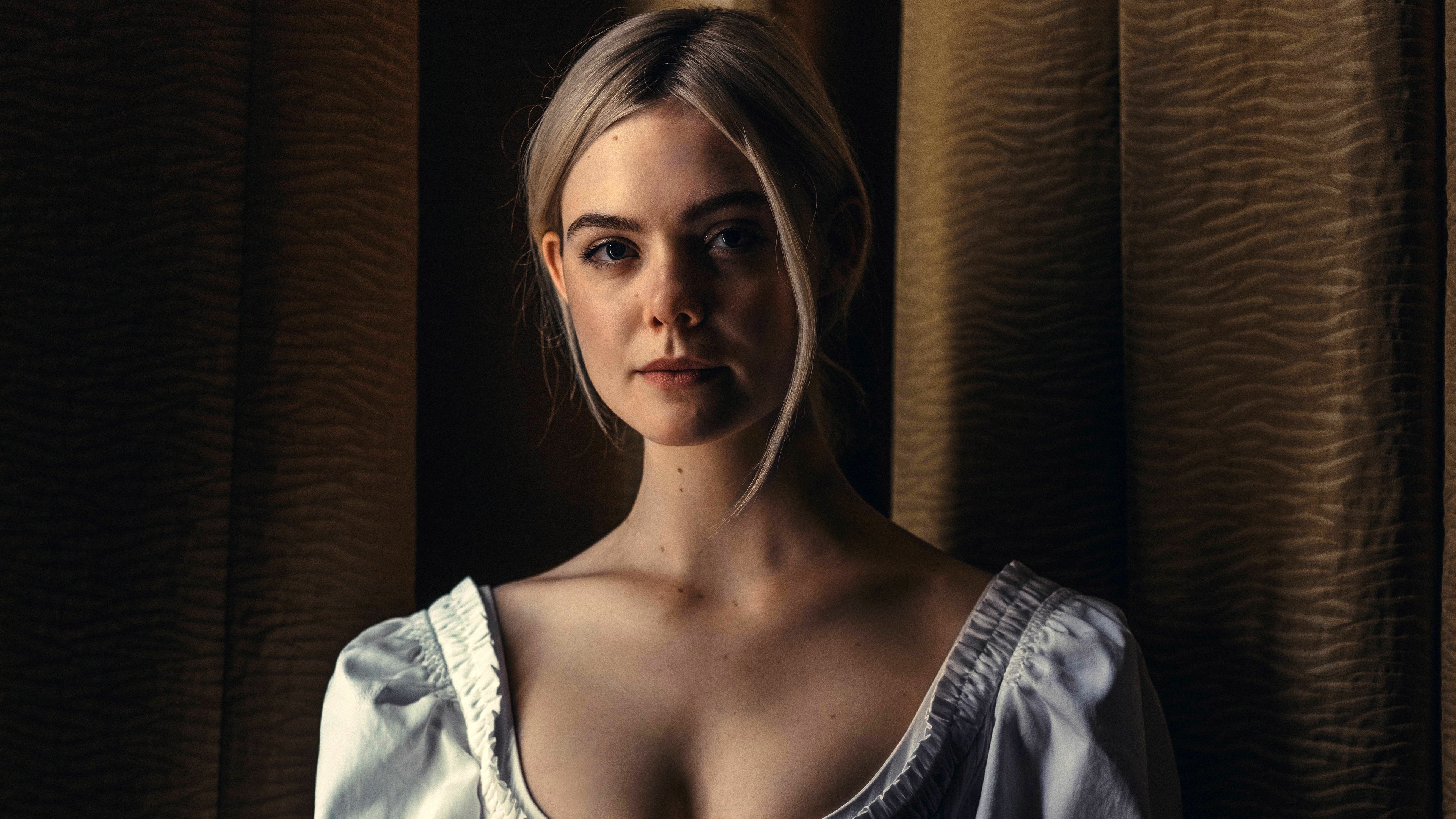 A close-up cinematic portrait of American actress Elle Fanning