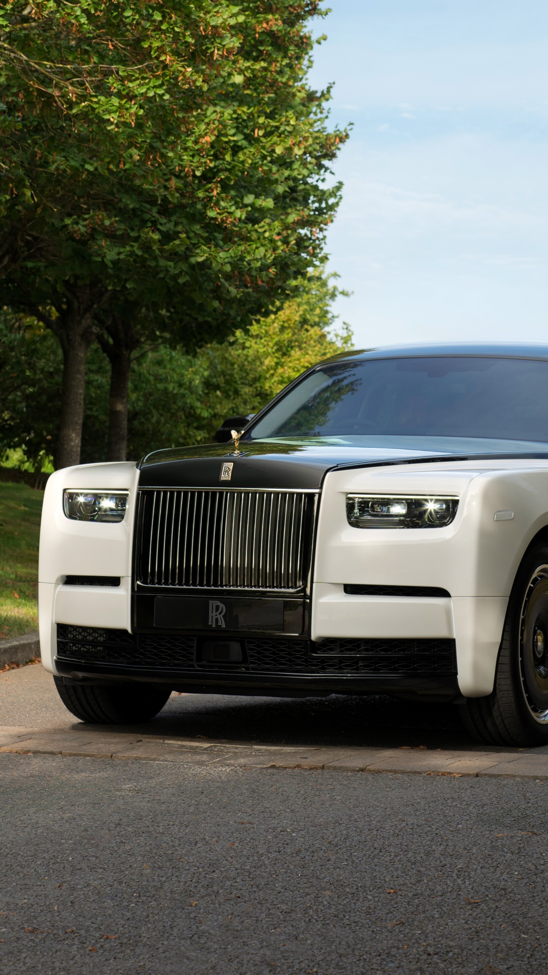 A high-detail, close-up shot of the prestigious Rolls-Royce Phantom Centenary luxury car.