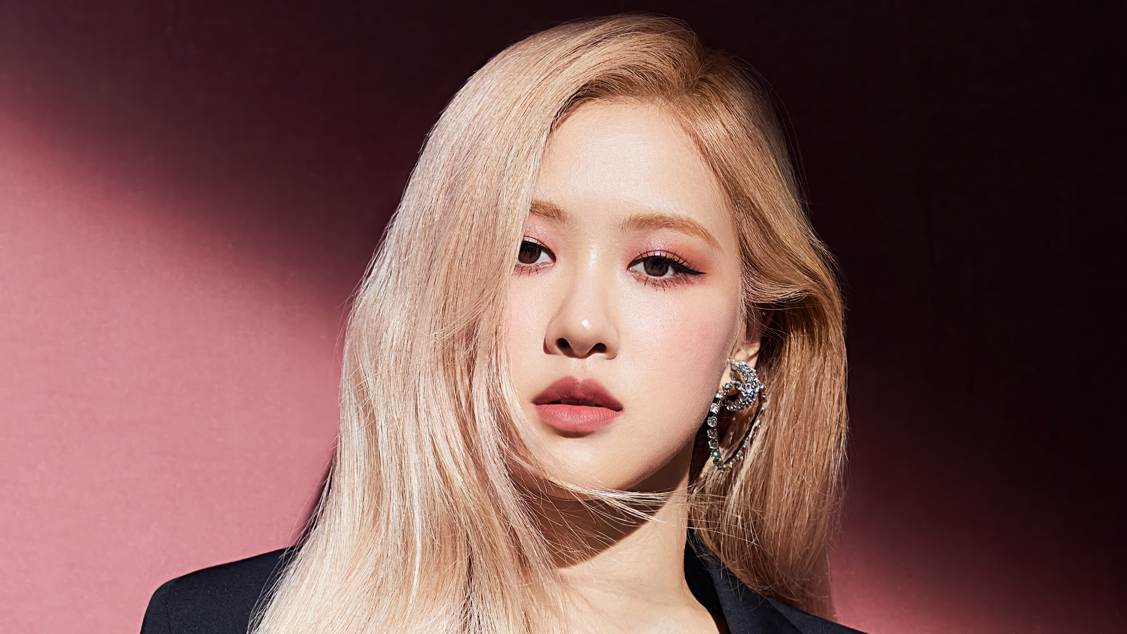 Rosé from BLACKPINK posing for a Vogue Korea inspired photoshoot with a pink aesthetic and focus on lipstick.