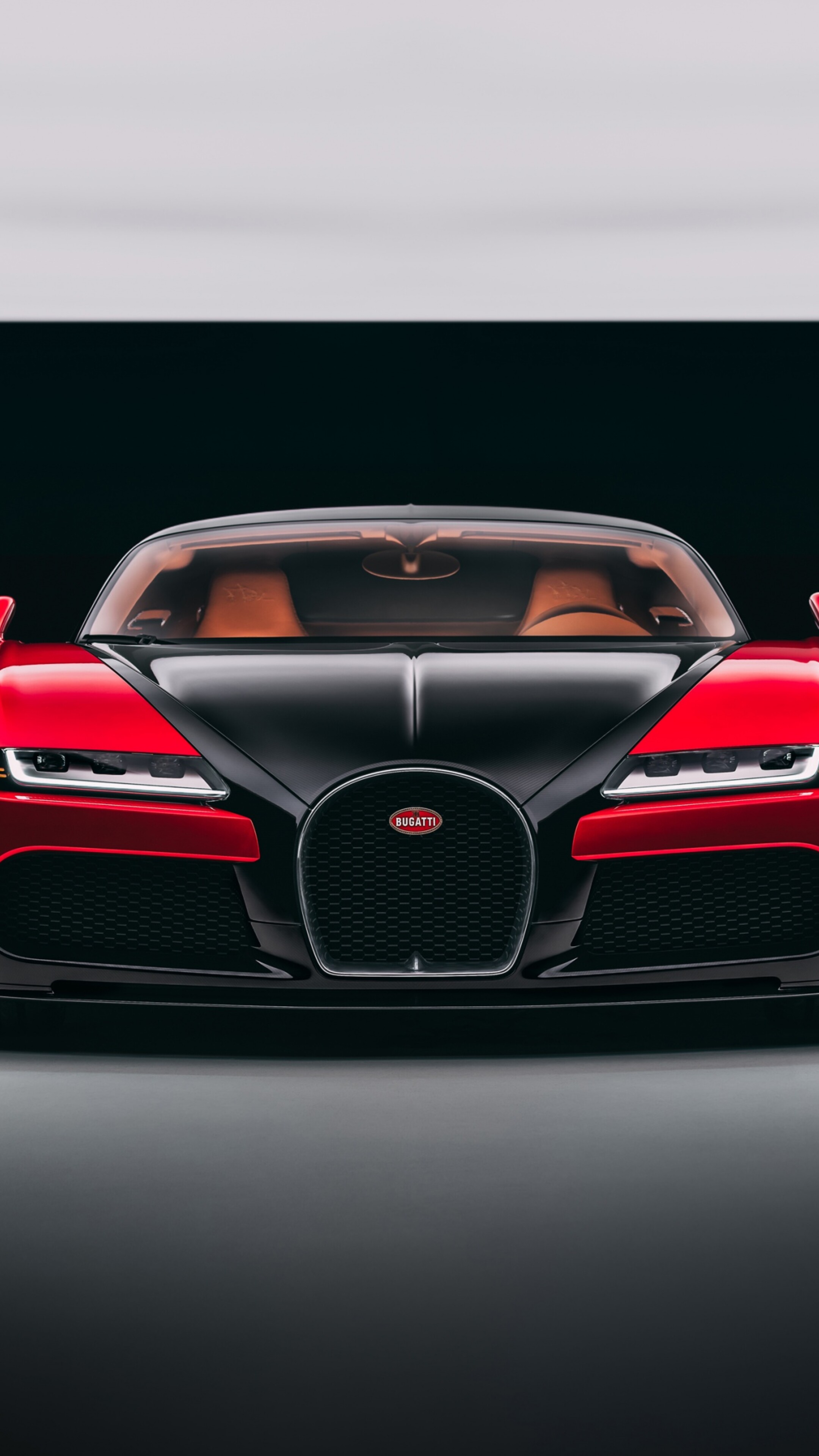 A sleek and futuristic 2026 Bugatti Veyron hypercar concept set against a dark, dramatic background.