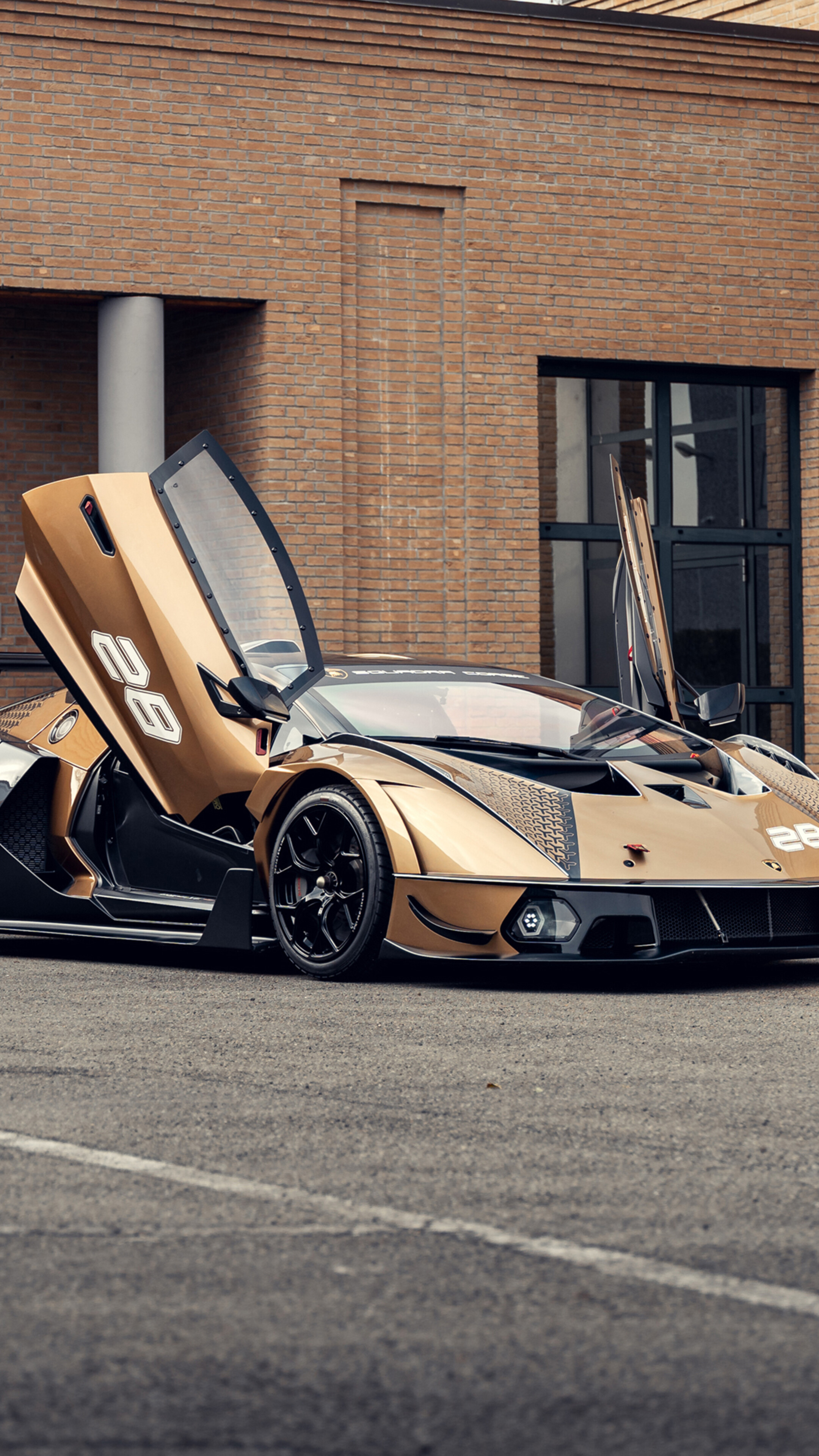 A high-performance Lamborghini Essenza SCV12 hypercar featuring aggressive aerodynamic styling.