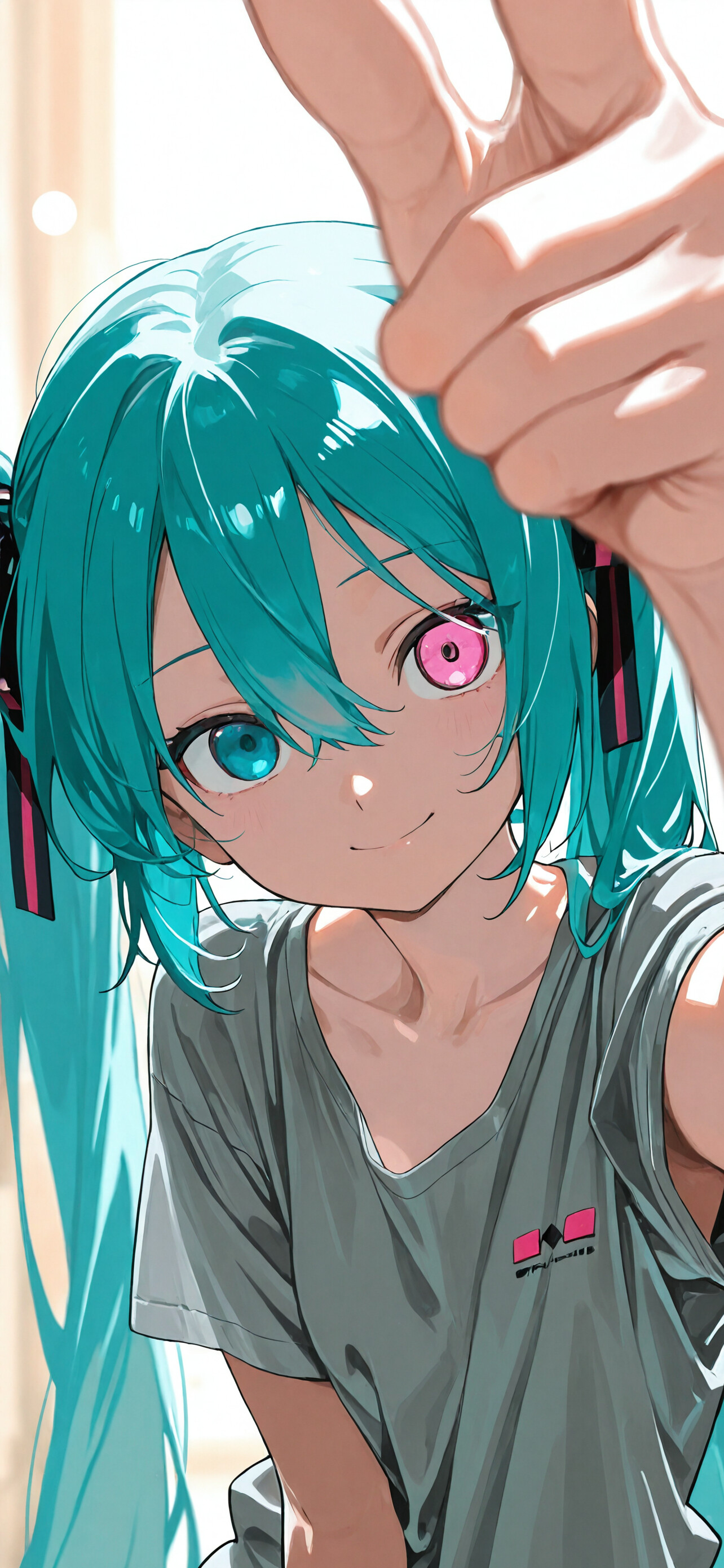 Hatsune Miku with long turquoise hair, one blue eye and one pink eye, wearing a grey shirt and playfully making a finger gun gesture towards the camera.