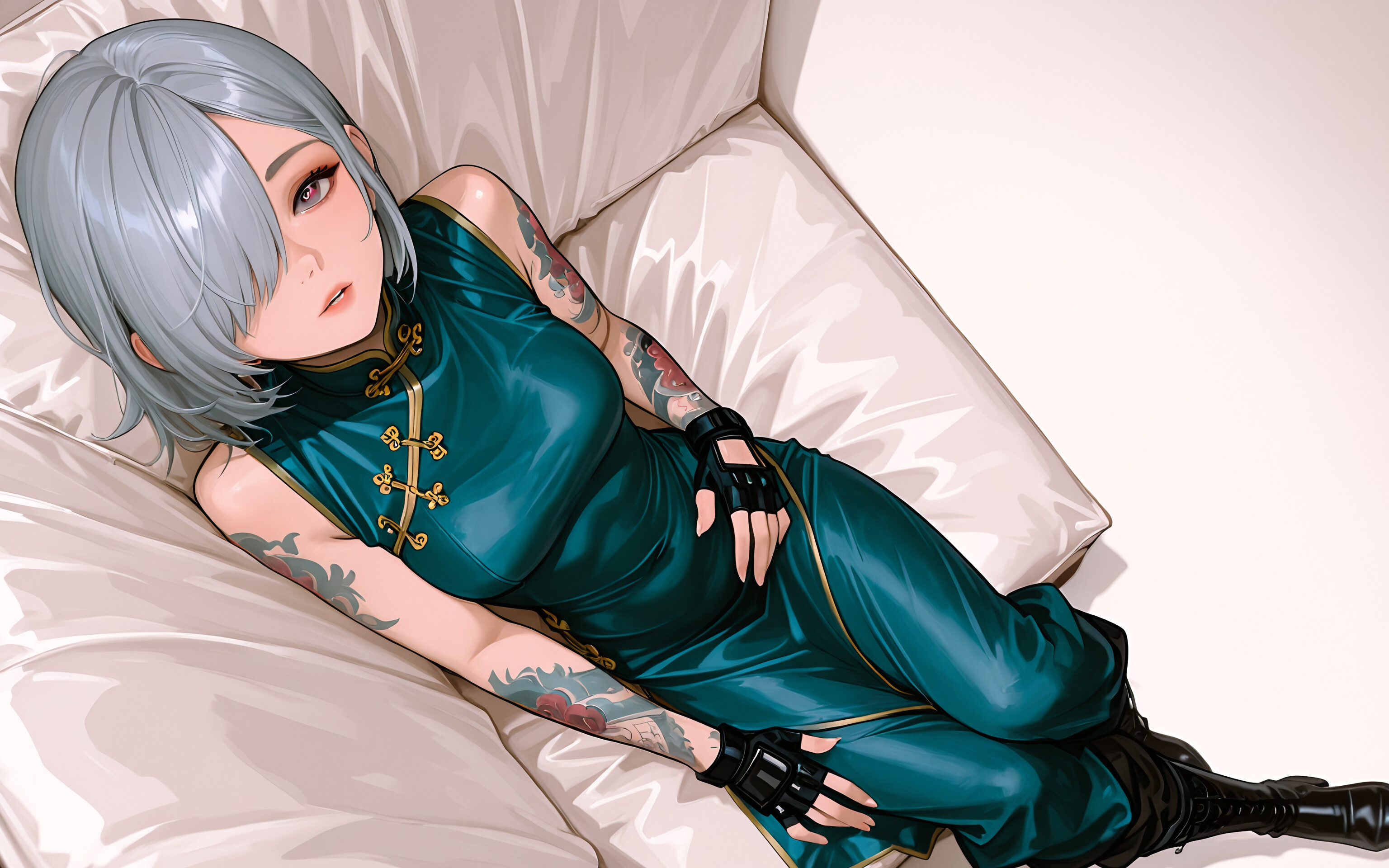 A young woman with short silver hair and an arm tattoo, wearing a teal Chinese dress outfit and black boots, sits on a white tiled floor and looks up at the camera.